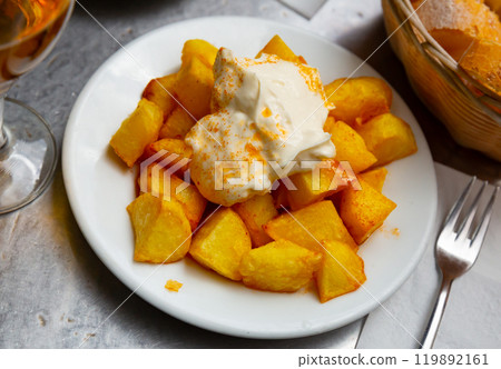 Spanish fried spicy potatoes Patatas bravas with sauces 119892161
