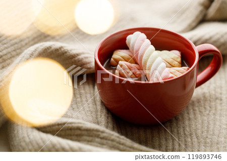 Cup of delicious hot chocolate on wooden table background. Cup of delicious hot chocolate on wooden table background. 119893746