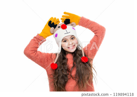 Winter fashion style. Girl in knitwear. Portrait of teen child wearing warm winter clothes. Girl kid wear warm hat isolated on white. Happy childhood. Teen girl in earflap hat. Knitted accessories 119894118