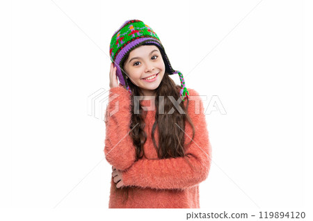 Teen kid girl wearing warm knitted winter earflap hat and sweater isolated on white 119894120
