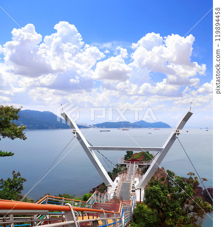 Songdo Yonggung Suspension Bridge and seascape, Busan, South Korea. Beatiful sea landscape with a bridge to a rocky island, Amnam Park, Busan, Republic of Korea Songdo Yonggung Suspension Bridge and seascape, Busan, South Korea. Beatiful sea landscape with a bridge to a rocky island, Amnam Park, Busan, Republic of Korea 119894458