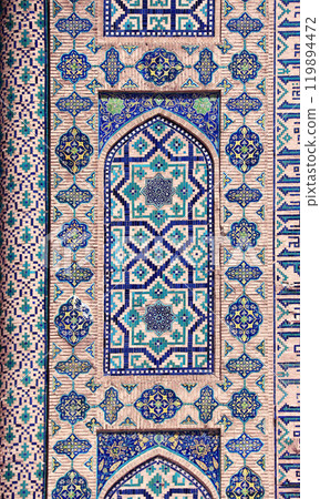 Vertical background with detail of ancient mosaic wall of Sher-dor Madrassah, Registan complex, Samarkand, Uzbekistan. Traditional iranian tile decorations Vertical background with detail of ancient mosaic wall of Sher-dor Madrassah, Registan complex, Samarkand, Uzbekistan. Traditional iranian tile decorations 119894472
