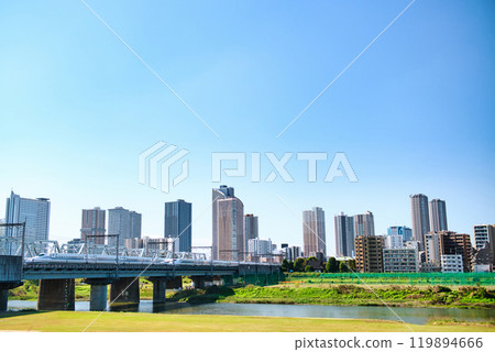 Kawasaki City: View of Musashi-Kosugi tower apartment complexes and the Shinkansen 119894666