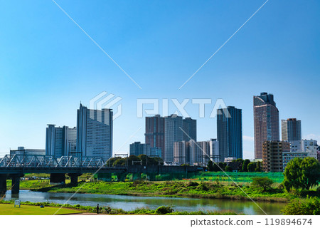 Kawasaki City: View of Musashi-Kosugi tower apartment complexes and the Shinkansen 119894674