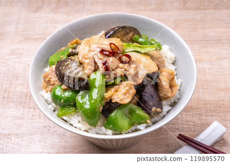 Rice bowl with fried eggplant, green peppers and pork with miso Rice bowl with fried eggplant, green peppers and pork with miso 119895570