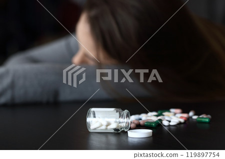 Woman lying after overdose of pills 119897754