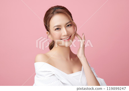 Beautiful young asian woman with clean fresh skin on pink background, Face care, Facial treatment, Cosmetology, beauty and spa, Asian women portrait. 119899247