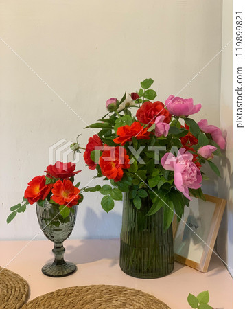 Bouquet of pale pink peonies. Peonies in a vase selective focus. Beautiful flowers close up. Valentine day. Womans day. Romantic vibe. Floral background. Copy space. High quality photo. 119899821