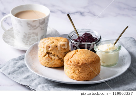Cream tea with scones, afternoon tea, milk tea, marble background 5 119903327