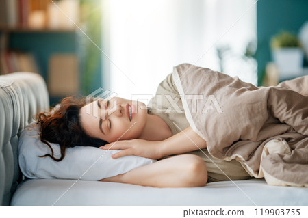 woman is sleeping in the bedroom woman is sleeping in the bedroom 119903755
