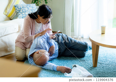 A collapsed senior man and his worried wife 119904376