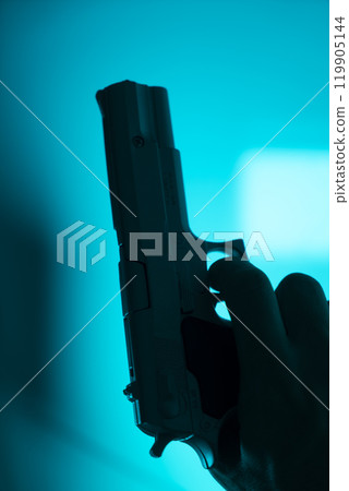 Man shooting pistol gun 119905144