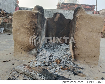 Rural kitchen. Traditional stoves used by residents in rural India, pakistan, Bangladesh, nepal, afganistan, Sri Lanka and undeveloped countries. made of clay, fueled with wood 119905360