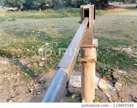 Constructed Indian Hand Pump Borewell in a Rural school in India. Water pump machine from a government school Borehole Water Point 119905588