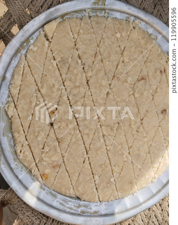 suji halwa making by indian muslim for shab e barat festival. 119905596