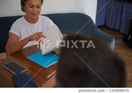 Woman sharing ideas with colleague in casual meeting setting 119906670