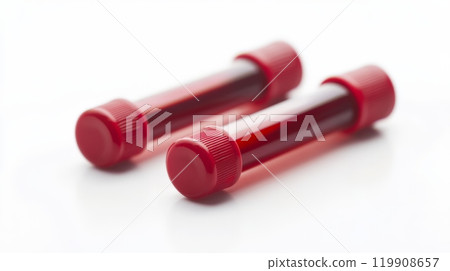 Two red-top blood collection tubes are positioned closely on a white background, ready for laboratory testing and medical analysis 119908657