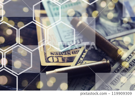 Live ammunition with bullets,  bills, close-up, selective focusing. Concept: sale of weapons under lend-lease, assistance with weapons, mercenaries in the army, trade in ammunition. 119909309