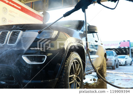 Self-service express car wash. Outdoor high pressure washing for cars. Self-service express car wash. Outdoor high pressure washing for cars. 119909394