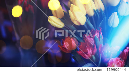 Abstract flower background with bokeh, tulip flowers close-up in a vase. Mothers Day. Abstract flower background with bokeh, tulip flowers close-up in a vase. Mothers Day. 119909444