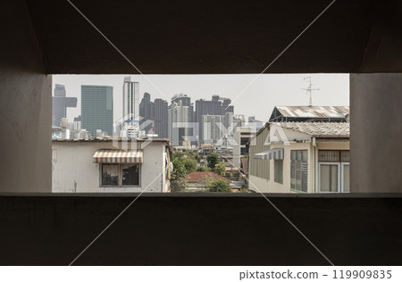 Cityscape view of Bangkok with a mix of Old house and Modern skyscrapers background. 119909835