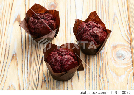 Sweet Baked berries muffins ( cupcake )  . Top view 119910052