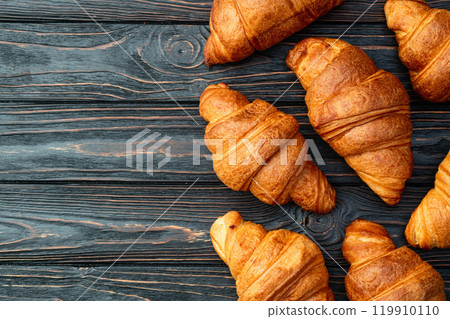 Group of sweet croissant . French morning breakfast . Top view Group of sweet croissant . French morning breakfast . Top view 119910110