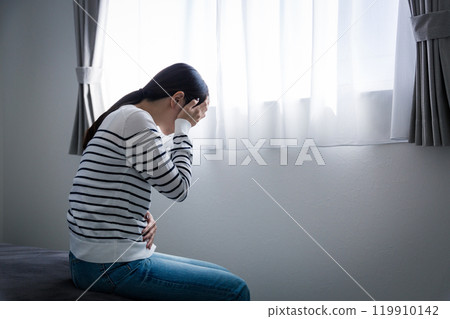 Women suffering from menstrual cramps Women suffering from menstrual cramps 119910142