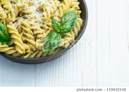 Pasta with basil sauce pesto . Italian food photography . Top view Pasta with basil sauce pesto . Italian food photography . Top view 119910148