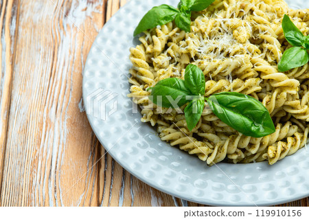 Pasta with basil sauce pesto . Italian food photography . Top view Pasta with basil sauce pesto . Italian food photography . Top view 119910156