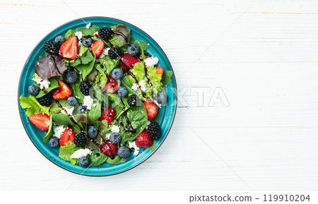 Berries salad (blueberry strawberry blackberry ) with cheese feta and balsamic sauce 119910204