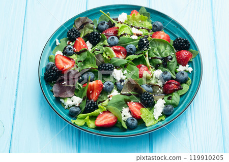 Berries salad (blueberry strawberry blackberry ) with cheese feta and balsamic sauce Berries salad (blueberry strawberry blackberry ) with cheese feta and balsamic sauce 119910205