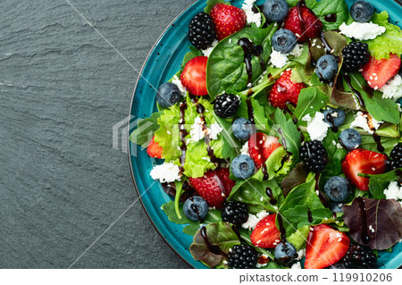 Berries salad (blueberry strawberry blackberry ) with cheese feta and balsamic sauce 119910206