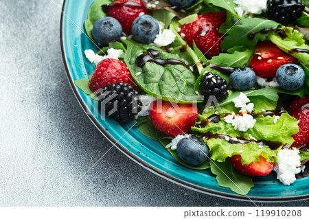 Berries salad (blueberry strawberry blackberry ) with cheese feta and balsamic sauce 119910208
