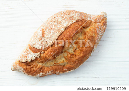 Loaf of wheat hearth bread . Top view Loaf of wheat hearth bread . Top view 119910209