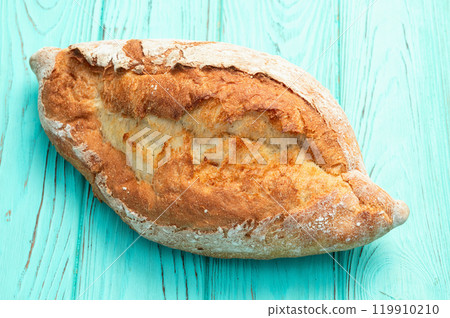 Loaf of wheat hearth bread . Top view Loaf of wheat hearth bread . Top view 119910210