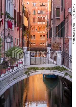 Venice, Italy street, canal and small bridge Venice, Italy street, canal and small bridge 119910747