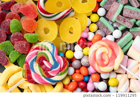 Mix of colorful candies . Top view Mix of colorful candies . Top view 119911295