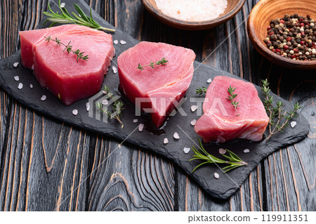 Raw tuna steak ( fillet ) photography . Top view 119911351