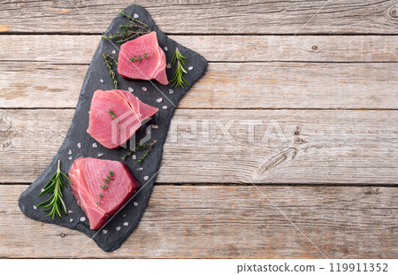Raw tuna steak ( fillet ) photography . Top view 119911352