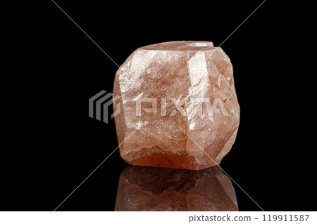 macro mineral garnet stone on a black background 119911587