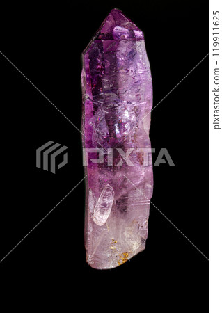 macro mineral amethyst stone on a black background 119911625