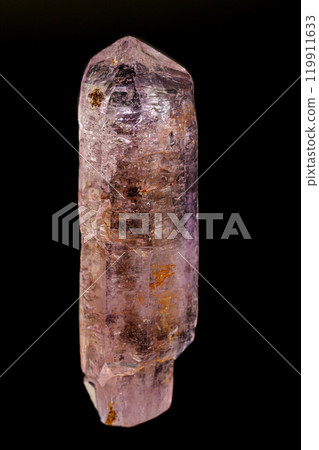 macro mineral amethyst stone on a black background 119911633