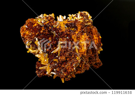 macro mineral Wulfenite stone on a black background macro mineral Wulfenite stone on a black background 119911638