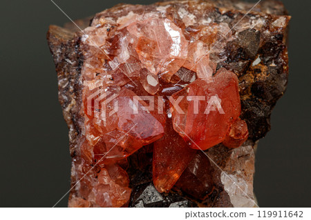 macro mineral stone Rhodochrosite on a black background macro mineral stone Rhodochrosite on a black background 119911642