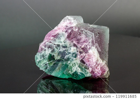 macro mineral stone red and green fluorite on a black background macro mineral stone red and green fluorite on a black background 119911685