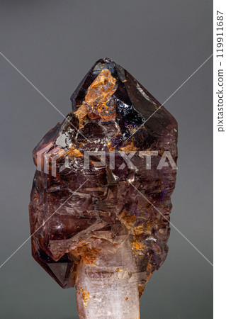 macro mineral stone amethyst with smoky quartz on a black background macro mineral stone amethyst with smoky quartz on a black background 119911687