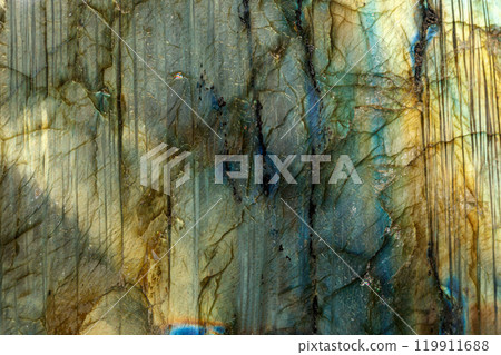 macro mineral stone labradorite on a black background 119911688