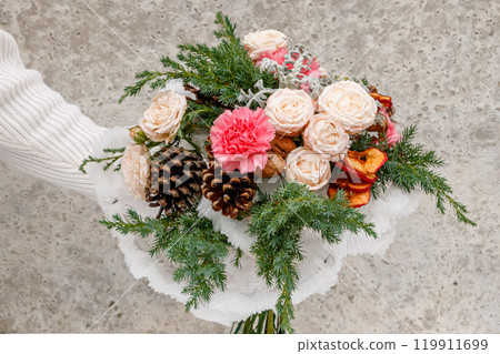 Christmas composition of flowers and Christmas decorations 119911699