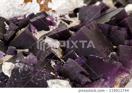Macro stone mineral Fluorite on a white background Macro stone mineral Fluorite on a white background 119911744
